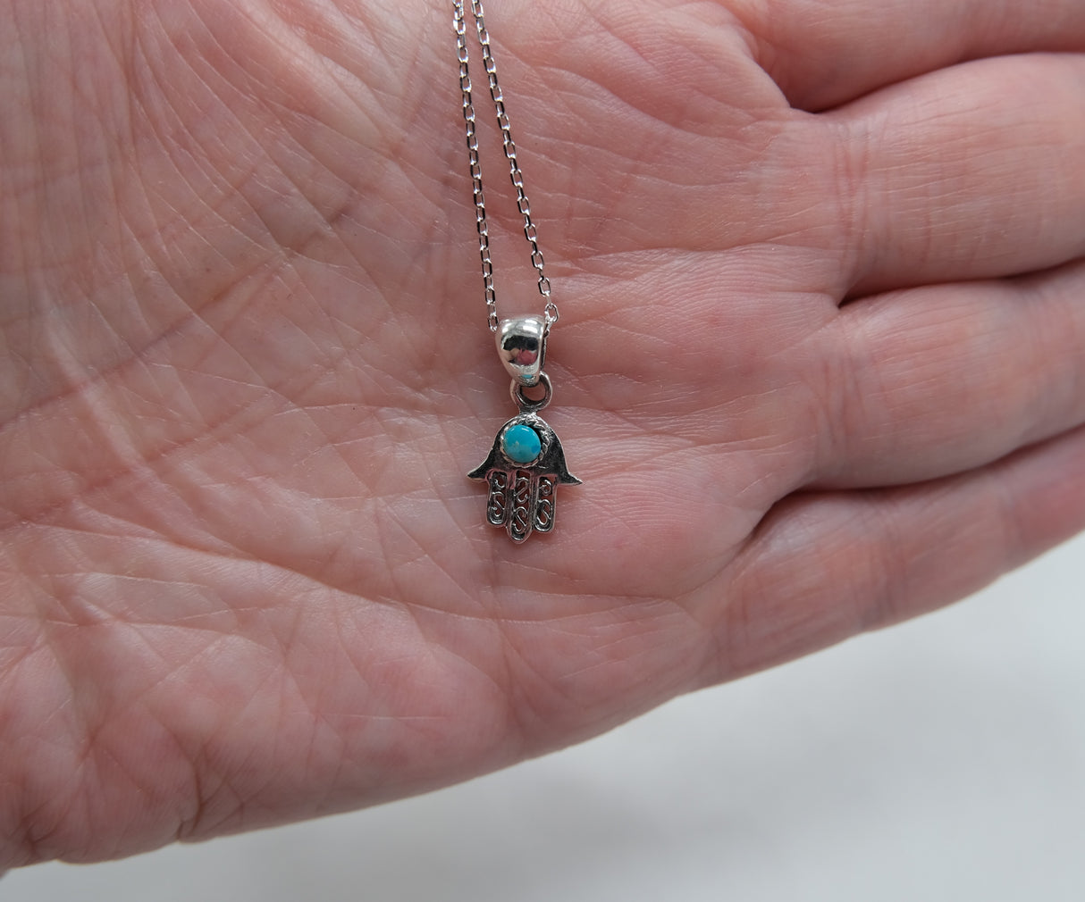 Genuine Turquoise Hamsa Pendant Necklace on 16 inch Rhodium Chain