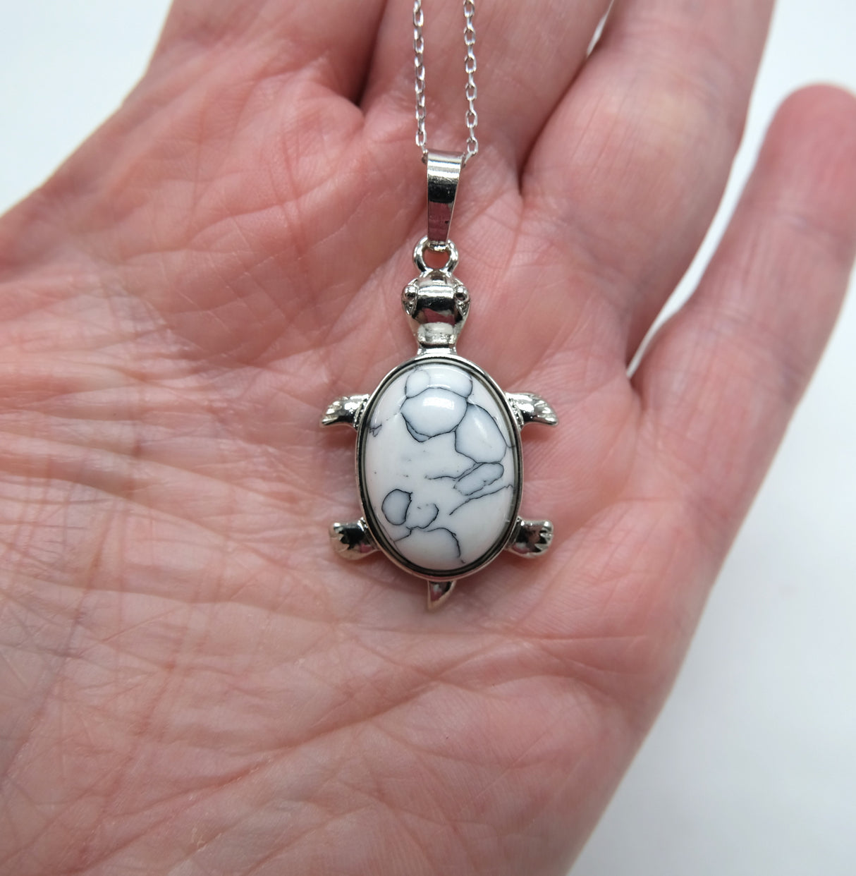 Howlite Turtle Pendant 16 Inch Rhodium Plated Necklace