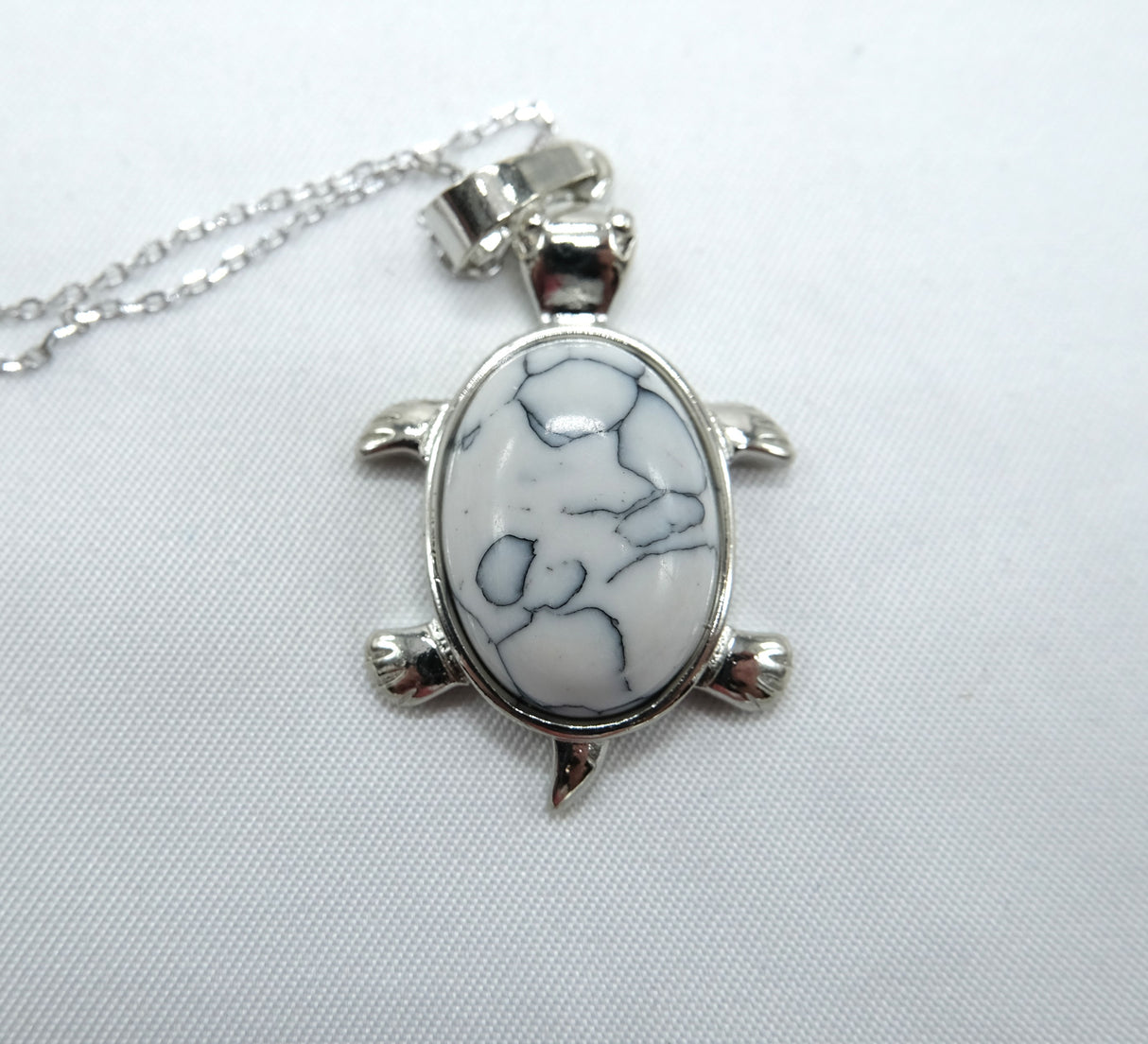 Howlite Turtle Pendant 16 Inch Rhodium Plated Necklace