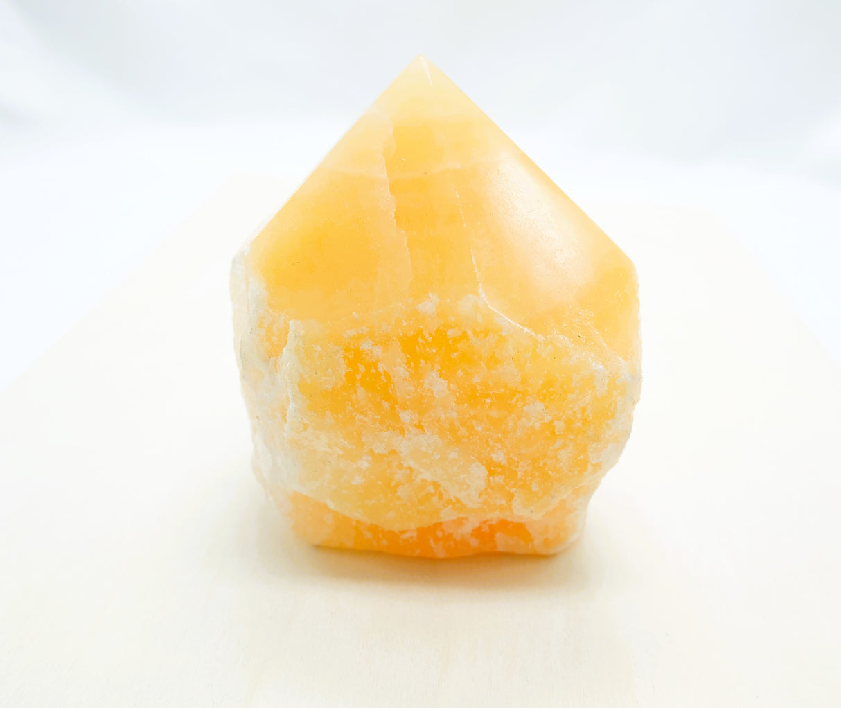 Orange Calcite Polished Points with a Flat Base