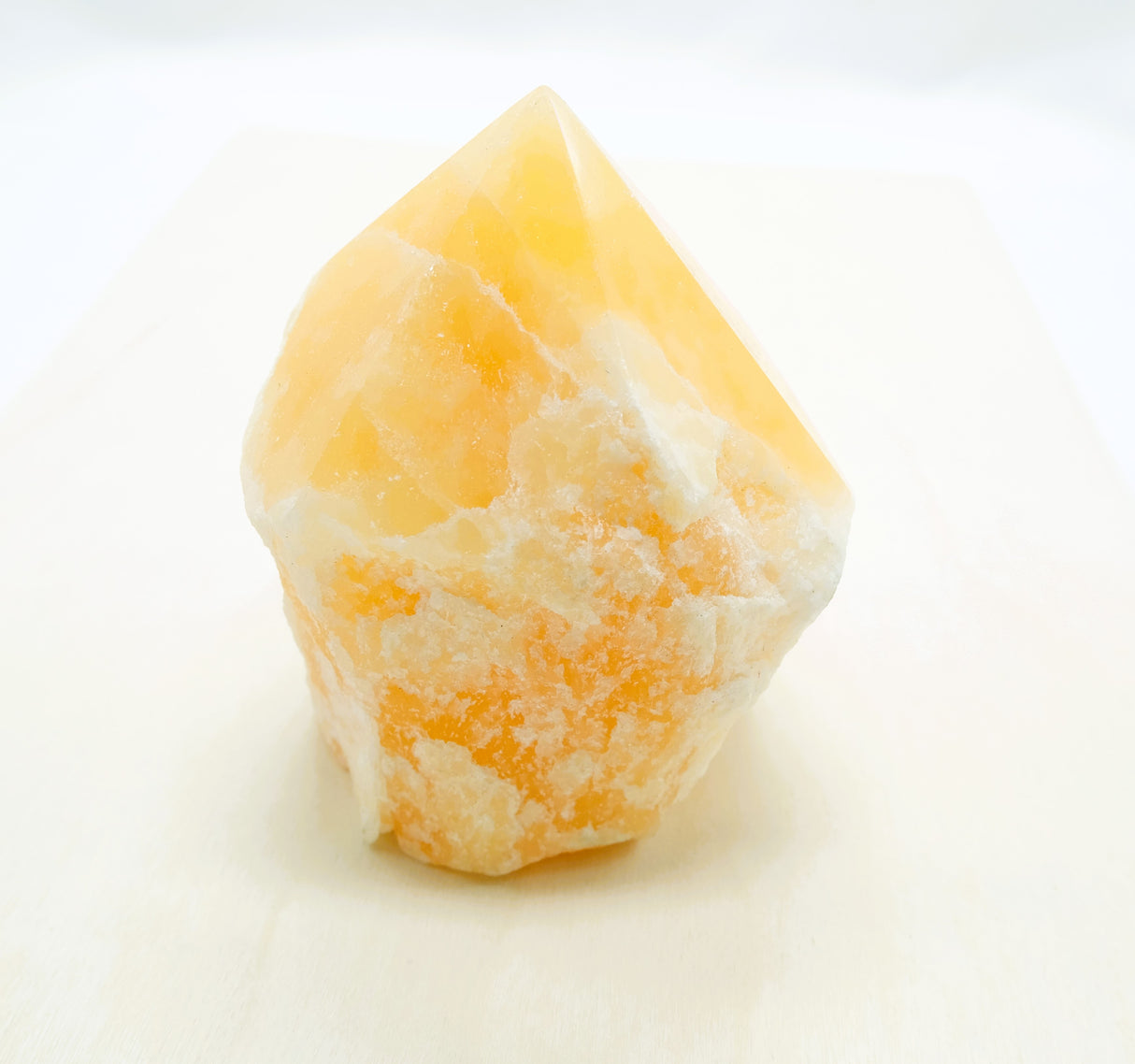 Orange Calcite Polished Points with a Flat Base