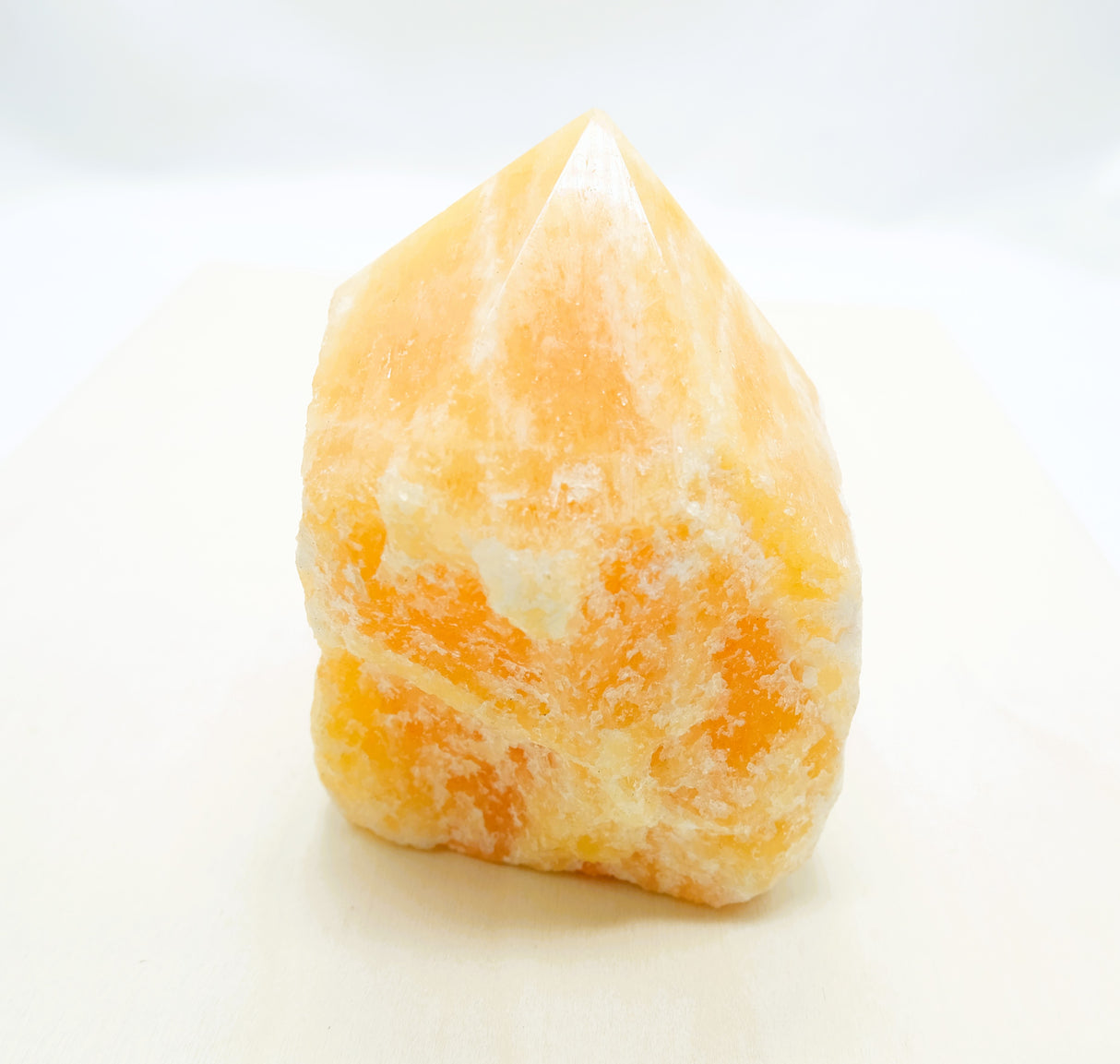 Orange Calcite Polished Points with a Flat Base