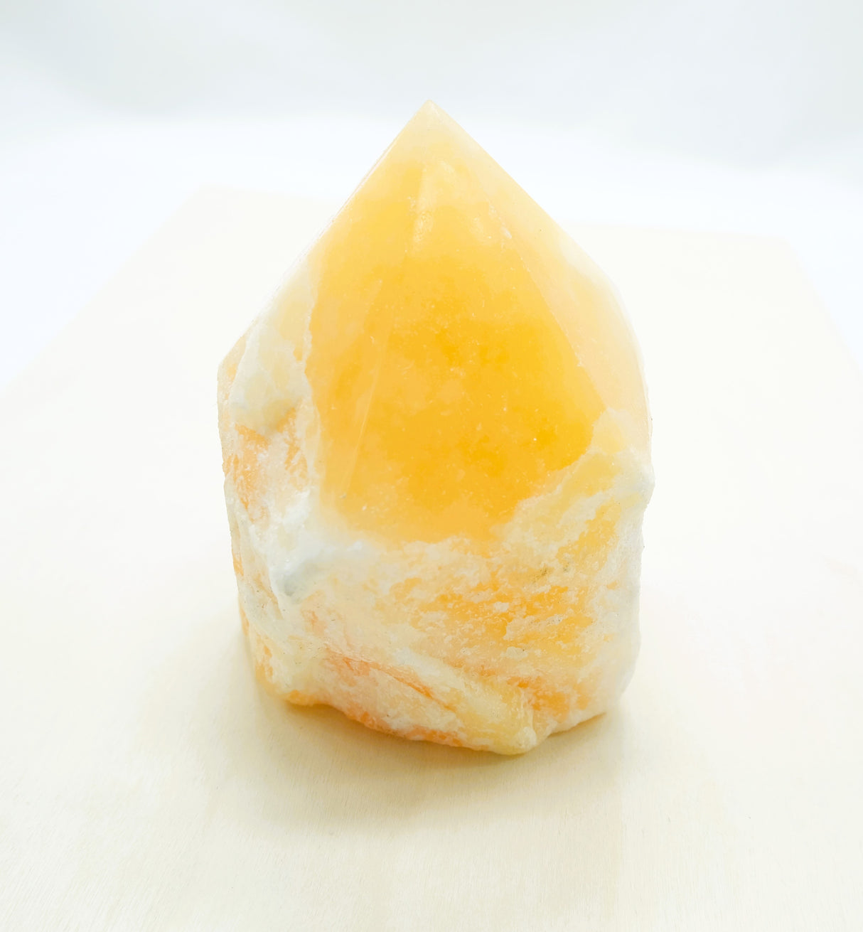 Orange Calcite Polished Points with a Flat Base